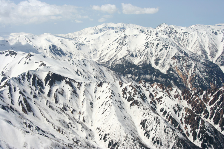 槍ヶ岳山頂から見た薬師岳方面の写真