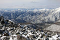 那須の茶臼岳から写した上越方面の山々の写真にリンク