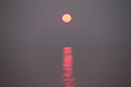 オホーツク海に沈む夕日の写真にリンク