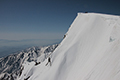 白馬岳山頂と主稜を登る人の写真にリンク